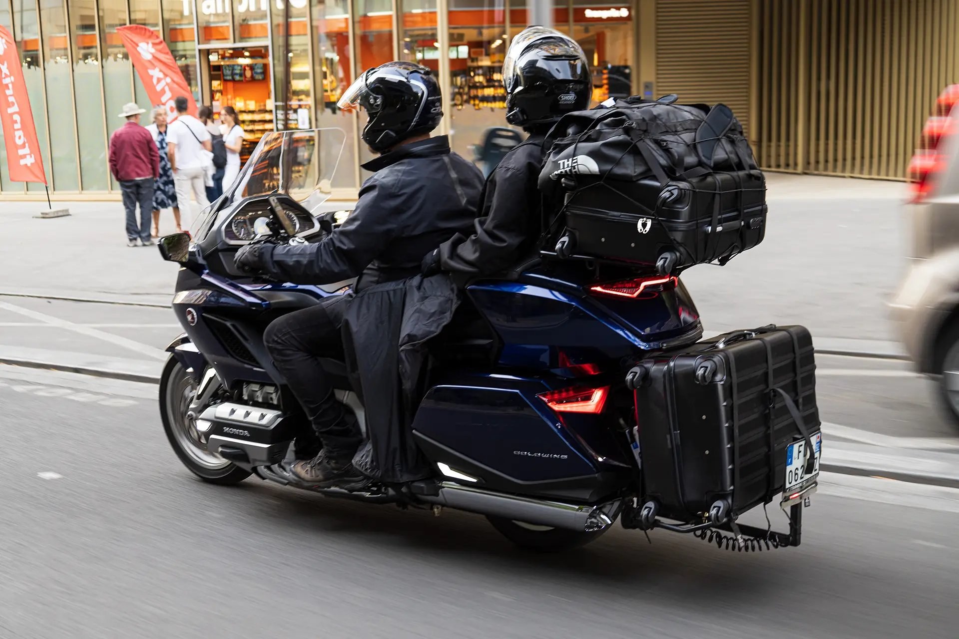 Livréko moto-taxi avec passager et bagages